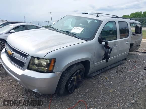 2014 Chevrolet Suburban LT z VIN 1GNSCJE0XER203597, wystawiony jako IAAI lot #42215407 z przebiegiem 186 556 mil mil oraz . Historia ofert i sprzedaży dostępna na DreamBid. Obrazek 20.