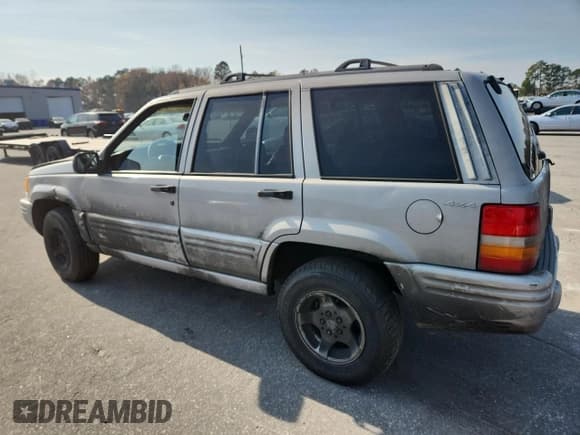 ✅ 1998 Jeep Grand Cherokee Laredo • VIN: 1J4GZ48S4WC338715 • Лот: 93702435. Опубликован ранее на Copart с пробегом 178 146 миль. Бесплатный доступ к архиву аукционных продаж из США и подробный отчёт об истории автомобиля на DreamBid. Изображение 2.