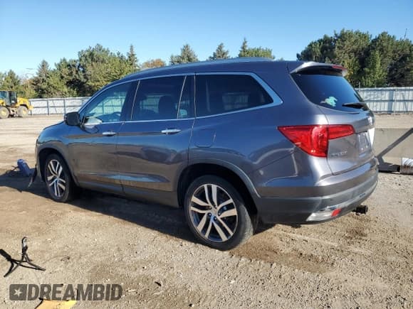 ✅ 2018 Honda Pilot Touring • VIN: 5FNYF6H91JB005668 • Лот: 85587675. Опубликован ранее на Copart с пробегом 104 956 миль. Бесплатный доступ к архиву аукционных продаж из США и подробный отчёт об истории автомобиля на DreamBid. Изображение 2.