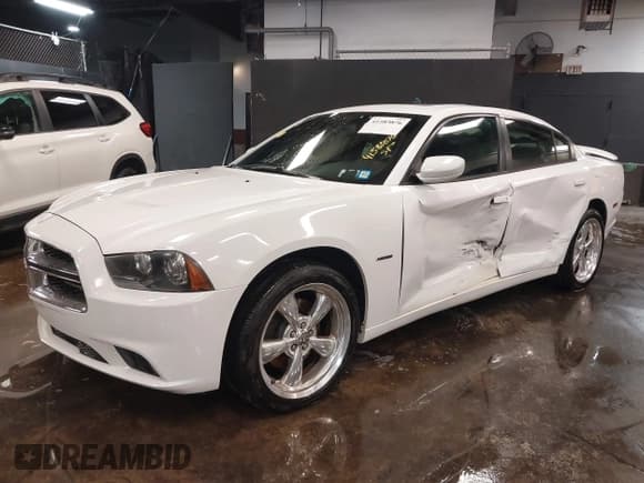 ✅ 2013 Dodge Charger RT Plus • VIN: 2C3CDXDT4DH537913 • Lot: 41583876. Listed on IAAI with 90,648 mi. Free auction sales archive from the USA and detailed vehicle history report at DreamBid. Image 17.
