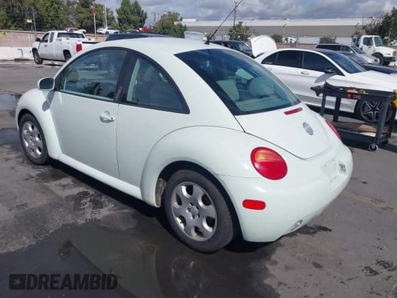 ✅ 2002 Volkswagen Beetle GLS • VIN: 3VWCB21C92M454501 • Lot: 43358460. Listed on IAAI with 64,980 mi. Free auction sales archive from the USA and detailed vehicle history report at DreamBid. Image 3.