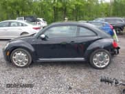 ✅ 2013 Volkswagen Beetle Fender Edition • VIN: 3VWJP7AT6DM687633 • Lot: 42368984. Listed on IAAI with 137,459 mi. Free auction sales archive from the USA and detailed vehicle history report at DreamBid. Image 14.