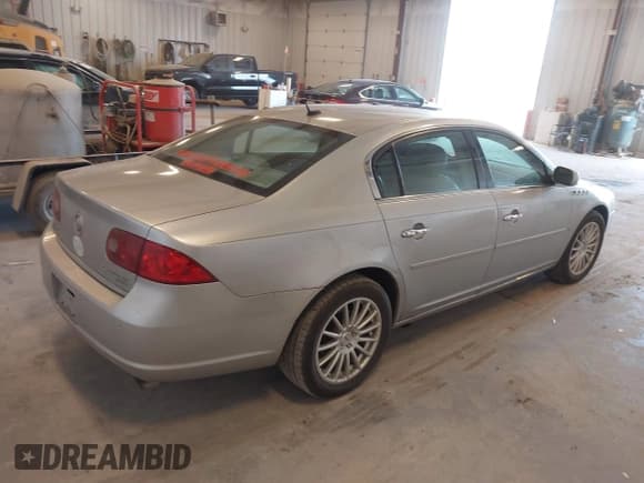 ✅ 2007 Buick Lucerne CXS • VIN: 1G4HE57Y87U224905 • Lot: 42141536. Listed on IAAI with 209,192 mi. Free auction sales archive from the USA and detailed vehicle history report at DreamBid. Image 4.