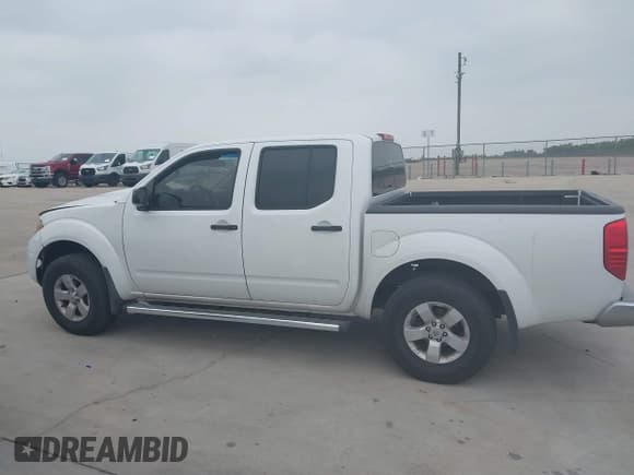 ✅ 2012 Nissan Frontier SV • VIN: 1N6AD0EV0CC437722 • Lot: 42308822. Listed on IAAI with 180,996 mi. Free auction sales archive from the USA and detailed vehicle history report at DreamBid. Image 13.