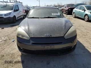 2008 Hyundai Tiburon GT z VIN KMHHN66F18U286993, wystawiony jako Copart lot #48743215 z przebiegiem 181 936 mil mil oraz Szkoda całkowita • Salvage title. Historia ofert i sprzedaży dostępna na DreamBid. Obrazek 5.