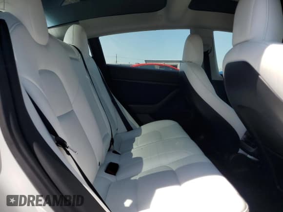 ✅ 2021 Tesla Model 3 Standard Range Plus • VIN: 5YJ3E1EAXMF977983 • Лот: 53858465. Опубликован ранее на Copart с пробегом 28 279 миль. Бесплатный доступ к архиву аукционных продаж из США и подробный отчёт об истории автомобиля на DreamBid. Изображение 10.