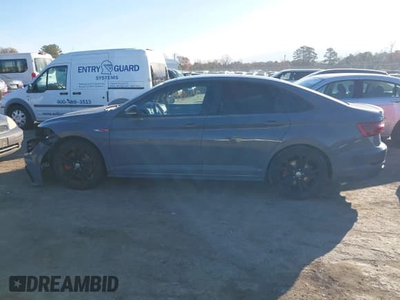 ✅ 2021 Volkswagen Jetta S • VIN: 3VW6T7BU8MM081520 • Лот: 43619003. Опубликован ранее на IAAI с пробегом 68 255 миль. Бесплатный доступ к архиву аукционных продаж из США и подробный отчёт об истории автомобиля на DreamBid. Изображение 14.