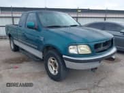 ✅ 1998 Ford F-150 • VIN: 1FTZX1768WKB54603 • Lot: 42726342. Listed on IAAI with 151,409 mi. Free auction sales archive from the USA and detailed vehicle history report at DreamBid. Image 1.