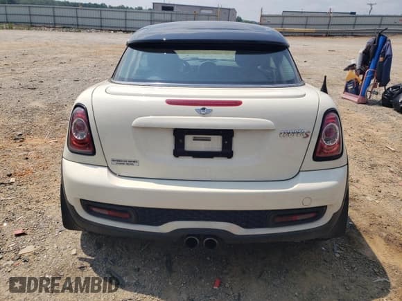 ✅ 2012 MINI Coupe S • VIN: WMWSX3C51CT154858 • Lot: 64205805. Listed on Copart with 83,961 mi. Free auction sales archive from the USA and detailed vehicle history report at DreamBid. Image 10.