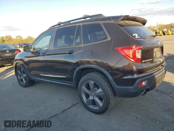 ✅ 2021 Honda Passport Touring • VIN: 5FNYF8H94MB015224 • Lot: 87258535. Listed on Copart with 54,506 mi. Free auction sales archive from the USA and detailed vehicle history report at DreamBid. Image 2.