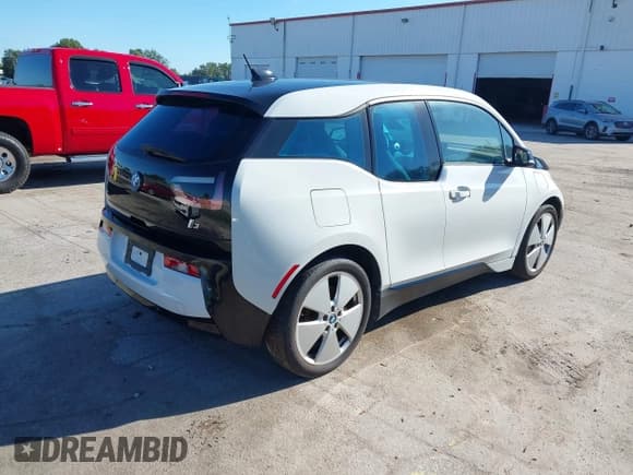 ✅ 2015 BMW i3 • VIN: WBY1Z4C57FV500286 • Lot: 43317013. Listed on IAAI with 88,597 mi. Free auction sales archive from the USA and detailed vehicle history report at DreamBid. Image 4.