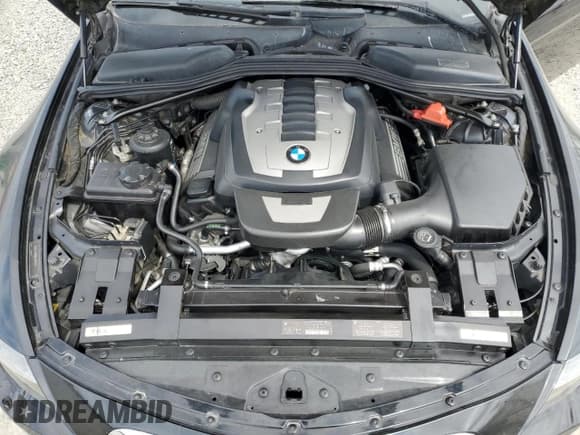 ✅ 2007 BMW 6 Series 650i • VIN: WBAEH13517CR52037 • Лот: 80124315. Опубликован ранее на Copart с пробегом 104 702 миль. Бесплатный доступ к архиву аукционных продаж из США и подробный отчёт об истории автомобиля на DreamBid. Изображение 11.