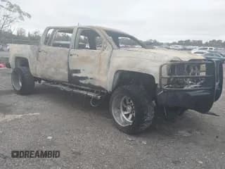 ✅ 2018 Chevrolet Silverado 2500HD High Country • VIN: 1GC1KXEY8JF103073 • Лот: 41621869. Опубликован ранее на IAAI с пробегом Не указан. Бесплатный доступ к архиву аукционных продаж из США и подробный отчёт об истории автомобиля на DreamBid. Изображение 1.