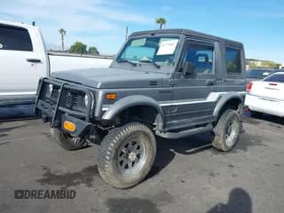 ✅ 1987 Suzuki Samurai • VIN: JS4JC51C8H4151011 • Lot: 43773082. Wystawiony na IAAI z przebiegiem 232 717 mil. Bezpłatny archiwum sprzedaży aukcyjnych z USA i szczegółowy raport historii pojazdu na DreamBid. Zdjęcie 6.