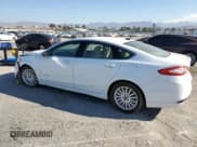 ✅ 2016 Ford Fusion SE Hybrid • VIN: 3FA6P0LU9GR157112 • Lot: 80173065. Listed on Copart with 84,969 mi. Free auction sales archive from the USA and detailed vehicle history report at DreamBid. Image 2.