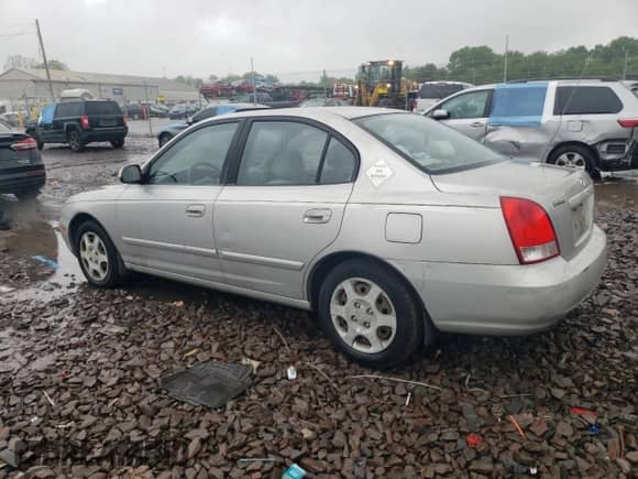 2003 Hyundai Elantra GLS z VIN KMHDN45D23U505391, wystawiony jako Copart lot #52038974 z przebiegiem 85 562 mil mil oraz Czysty tytuł • Clean title. Historia ofert i sprzedaży dostępna na DreamBid. Obrazek 2.