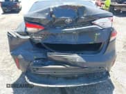 ✅ 2025 Toyota Corolla LE • VIN: 5YFB4MDE8SP272976 • Lot: 42198575. Wystawiony na IAAI z przebiegiem 13 029 mil. Bezpłatny archiwum sprzedaży aukcyjnych z USA i szczegółowy raport historii pojazdu na DreamBid. Zdjęcie 6.