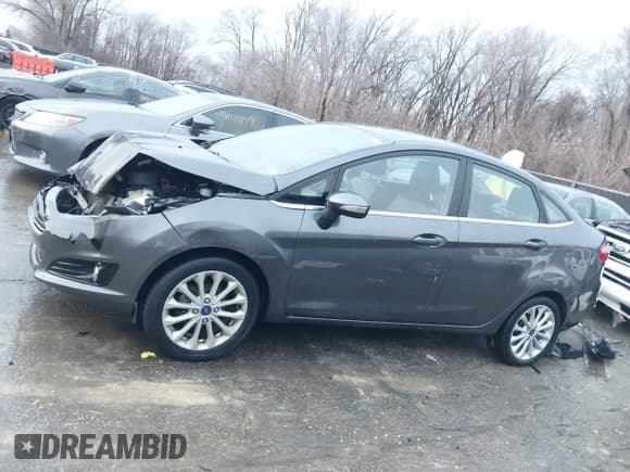 ✅ 2018 Ford Fiesta Titanium • VIN: 3FADP4CJ8JM117662 • Lot: 41199756. Listed on IAAI with 101,625 mi. Free auction sales archive from the USA and detailed vehicle history report at DreamBid. Image 15.