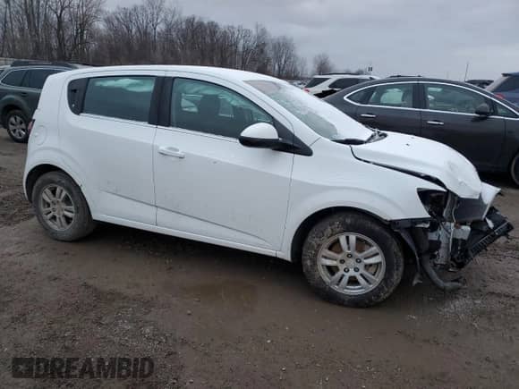 2013 Chevrolet Sonic LT с VIN 1G1JD6SB4D4254909, выставлен на аукционе Copart как лот 84000424 с пробегом 101 631 миль миль и Чистый • Clean title. История ставок и продаж доступна на DreamBid. Изображение 4.