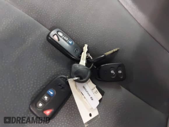 2012 Hyundai Santa Fe SE with VIN 5XYZHDAG5CG129742, listed as a IAAI auction lot 43241041 with 95,818 mi miles and . Bid and sale history available at DreamBid. Image 11.