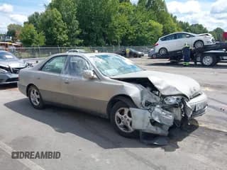 ✅ 1997 Lexus ES 300 • VIN: JT8BF22G5V0025169 • Lot: 40709685. Listed on IAAI with 273,055 mi. Free auction sales archive from the USA and detailed vehicle history report at DreamBid. Image 1.