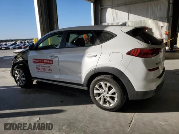 ✅ 2021 Hyundai Tucson SE • VIN: KM8J2CA47MU296355 • Lot: 82646715. Listed on Copart with 113,557 mi. Free auction sales archive from the USA and detailed vehicle history report at DreamBid. Image 2.
