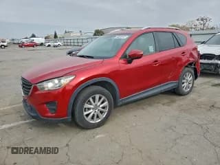 ✅ 2016 Mazda CX-5 Sport • VIN: JM3KE2BY5G0744980 • Lot: 91403285. Listed on Copart with 84,231 mi. Free auction sales archive from the USA and detailed vehicle history report at DreamBid. Image 1.