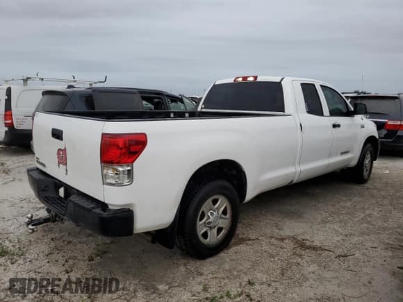 ✅ 2010 Toyota Tundra SR • VIN: 5TFTY5F15AX006775 • Lot: 76084304. Listed on Copart with 206,213 mi. Free auction sales archive from the USA and detailed vehicle history report at DreamBid. Image 3.