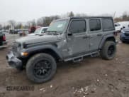 ✅ 2022 Jeep Wrangler Unlimited Willys Sport • VIN: 1C4HJXDM0NW256150 • Lot: 46171125. Wystawiony na Copart z przebiegiem 35 846 mil. Bezpłatny archiwum sprzedaży aukcyjnych z USA i szczegółowy raport historii pojazdu na DreamBid. Zdjęcie 1.