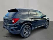 ✅ 2021 Honda Passport EX-L • VIN: 5FNYF8H52MB024288 • Lot: 94328035. Listed on Copart with 90,090 mi. Free auction sales archive from the USA and detailed vehicle history report at DreamBid. Image 4.