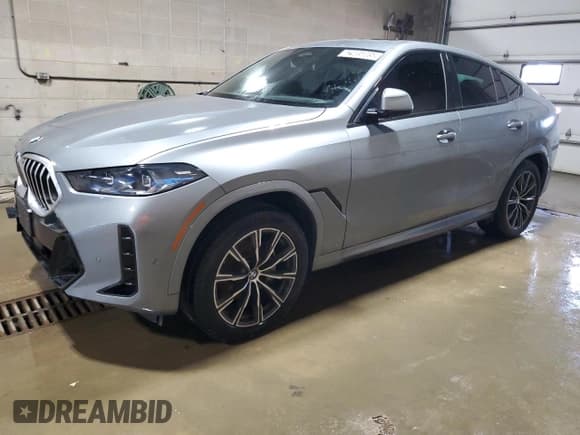 ✅ 2024 BMW X6 xDrive40i • VIN: 5UX33EX01R9S30113 • Лот: 62905085. Опубликован ранее на Copart с пробегом 10 076 миль. Бесплатный доступ к архиву аукционных продаж из США и подробный отчёт об истории автомобиля на DreamBid. Изображение 1.