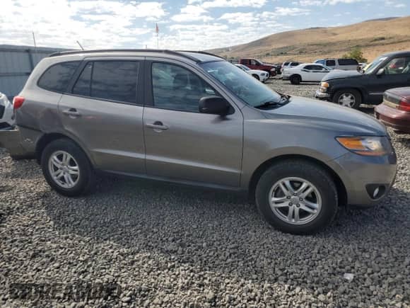 2011 Hyundai Santa Fe GLS с VIN 5XYZG3AB1BG063593, выставлен на аукционе Copart как лот 70283324 с пробегом 80 865 миль миль и Списание • Salvage title. История ставок и продаж доступна на DreamBid. Изображение 4.