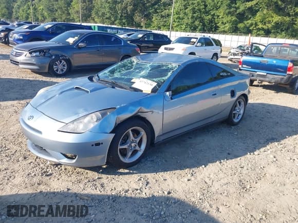 ✅ 2004 Toyota Celica GT • VIN: JTDDR32T440172361 • Lot: 42742130. Listed on IAAI with 136,446 mi. Free auction sales archive from the USA and detailed vehicle history report at DreamBid. Image 2.