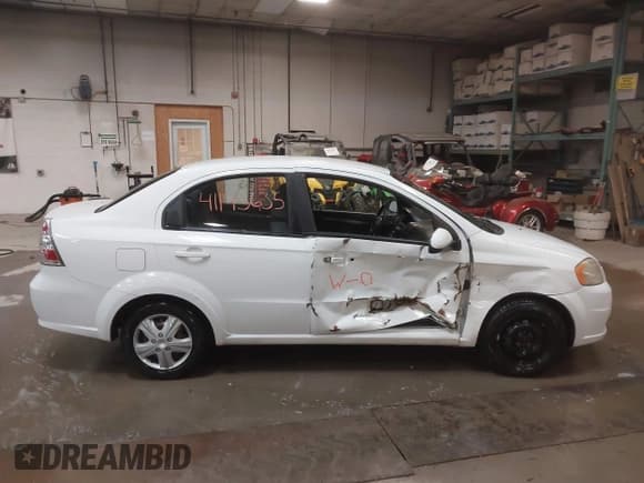 ✅ 2011 Chevrolet Aveo 1LT • VIN: KL1TD5DE5BB136613 • Lot: 41145635. Wystawiony na IAAI z przebiegiem 126 798 mil. Bezpłatny archiwum sprzedaży aukcyjnych z USA i szczegółowy raport historii pojazdu na DreamBid. Zdjęcie 13.