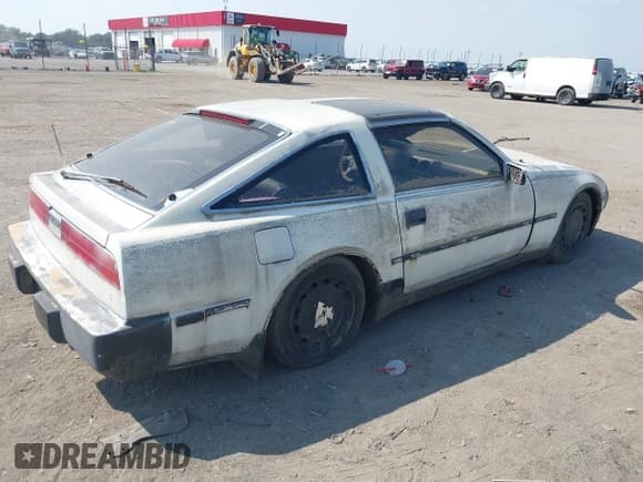 ✅ 1987 Nissan 300ZX GS • VIN: JN1HZ16S1HX120631 • Lot: 43181525. Listed on IAAI with 118,097 mi. Free auction sales archive from the USA and detailed vehicle history report at DreamBid. Image 4.