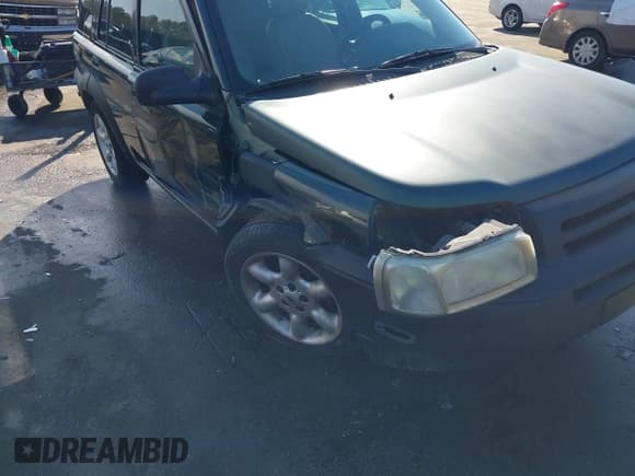 ✅ 2003 Land Rover Freelander • VIN: SALNY22233A223276 • Lot: 41409996. Listed on IAAI with 113,835 mi. Free auction sales archive from the USA and detailed vehicle history report at DreamBid. Image 6.