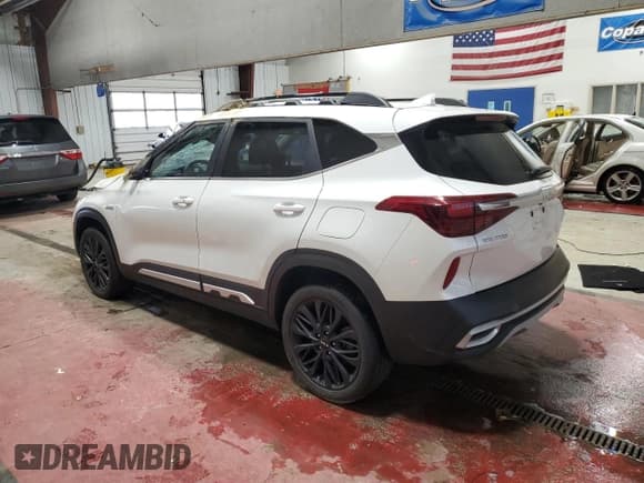 ✅ 2022 Kia Seltos Nightfall • VIN: KNDEUCA23N7266669 • Лот: 90419015. Опубликован ранее на Copart с пробегом 56 394 миль. Бесплатный доступ к архиву аукционных продаж из США и подробный отчёт об истории автомобиля на DreamBid. Изображение 2.