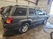 ✅ 2004 Jeep Grand Cherokee Laredo • VIN: 1J4GW48S64C341072 • Лот: 84983565. Опубликован ранее на Copart с пробегом 187 666 миль. Бесплатный доступ к архиву аукционных продаж из США и подробный отчёт об истории автомобиля на DreamBid. Изображение 3.