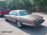 ✅ 1985 Jaguar XJ • VIN: SAJAY1341FC418447 • Лот: 42470003. Опубликован ранее на IAAI с пробегом 52 101 миль. Бесплатный доступ к архиву аукционных продаж из США и подробный отчёт об истории автомобиля на DreamBid. Изображение 3.