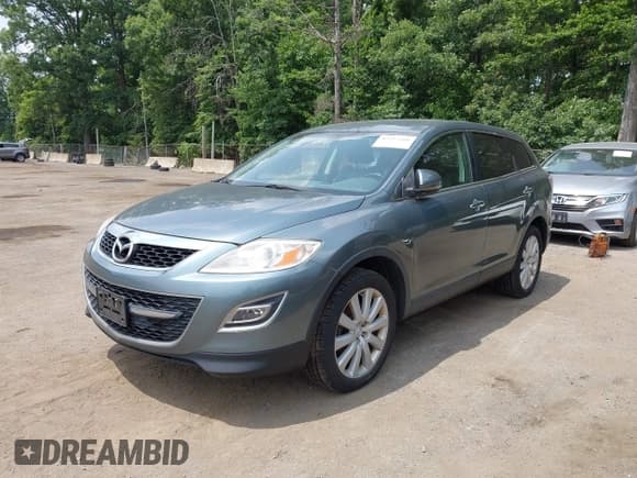 ✅ 2010 Mazda CX-9 Touring • VIN: JM3TB3MV5A0212870 • Lot: 42512166. Listed on IAAI with 171,009 mi. Free auction sales archive from the USA and detailed vehicle history report at DreamBid. Image 2.