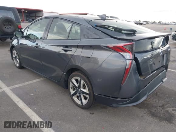 ✅ 2016 Toyota Prius Four • VIN: JTDKARFU4G3005473 • Lot: 43704013. Listed on IAAI with 159,431 mi. Free auction sales archive from the USA and detailed vehicle history report at DreamBid. Image 3.