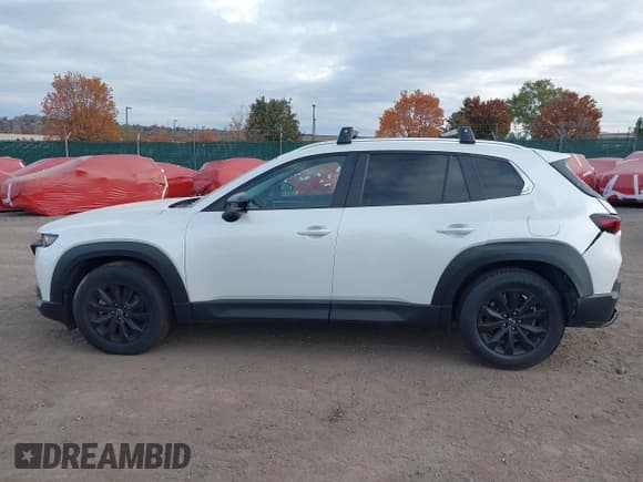 ✅ 2023 Mazda CX-50 S Preferred Plus • VIN: 7MMVABCM3PN133636 • Lot: 43424123. Listed on IAAI with 28,546 mi. Free auction sales archive from the USA and detailed vehicle history report at DreamBid. Image 14.