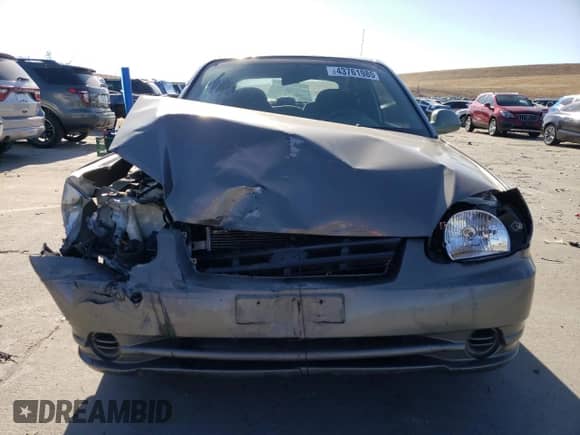 2005 Hyundai Accent GLS z VIN KMHCG35C55U337255, wystawiony jako Copart lot #43761985 z przebiegiem 192 585 mil mil oraz Szkoda całkowita • Salvage title. Historia ofert i sprzedaży dostępna na DreamBid. Obrazek 5.