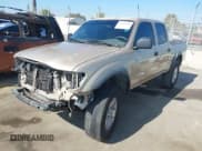 ✅ 2001 Toyota Tacoma PreRunner • VIN: 5TEGN92N71Z879074 • Lot: 43642008. Wystawiony na IAAI z przebiegiem 242 058 mil. Bezpłatny archiwum sprzedaży aukcyjnych z USA i szczegółowy raport historii pojazdu na DreamBid. Zdjęcie 2.