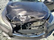 ✅ 2014 Infiniti Q50 Premium • VIN: JN1BV7APXEM685240 • Lot: 87089375. Listed on Copart with 144,439 mi. Free auction sales archive from the USA and detailed vehicle history report at DreamBid. Image 11.