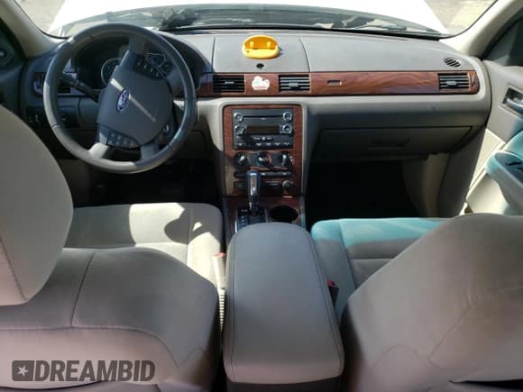 ✅ 2009 Ford Taurus • VIN: 1FAHP26W99G113459 • Lot: 51916015. Listed on Copart with 165,674 mi. Free auction sales archive from the USA and detailed vehicle history report at DreamBid. Image 8.