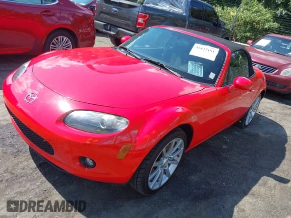 ✅ 2006 Mazda MX-5 Miata Sport • VIN: JM1NC25F560111660 • Lot: 42827191. Listed on IAAI with 71,282 mi. Free auction sales archive from the USA and detailed vehicle history report at DreamBid. Image 2.