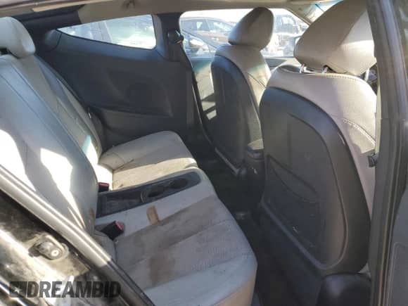 2012 Hyundai Veloster w/Red Int z VIN KMHTC6AD5CU030242, wystawiony jako Copart lot #83016604 z przebiegiem 142 555 mil mil oraz Szkoda całkowita • Salvage title. Historia ofert i sprzedaży dostępna na DreamBid. Obrazek 10.