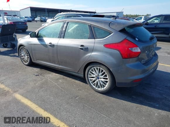 ✅ 2014 Ford Focus Titanium • VIN: 1FADP3N29EL416455 • Lot: 43717528. Listed on IAAI with 144,815 mi. Free auction sales archive from the USA and detailed vehicle history report at DreamBid. Image 3.