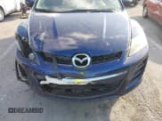 ✅ 2011 Mazda CX-7 i SV • VIN: JM3ER2A52B0354503 • Lot: 43654384. Listed on IAAI with 158,307 mi. Free auction sales archive from the USA and detailed vehicle history report at DreamBid. Image 6.